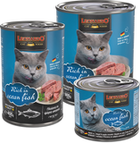 Three cans of Leonardo cat food with a blue label featuring a gray cat and ocean fish.