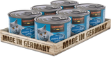 Leonardo cat food tins with ocean fish flavor in a wooden tray labeled 'Made in Germany'.