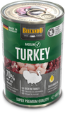 A can of Belcando Baseline Turkey dog food, featuring a green and white label with a photo of raw turkey and red meat pieces, set against a plain white background.