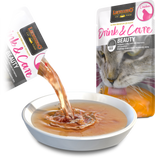 Cat food being poured into a bowl with a Leonardo cat food package in the background